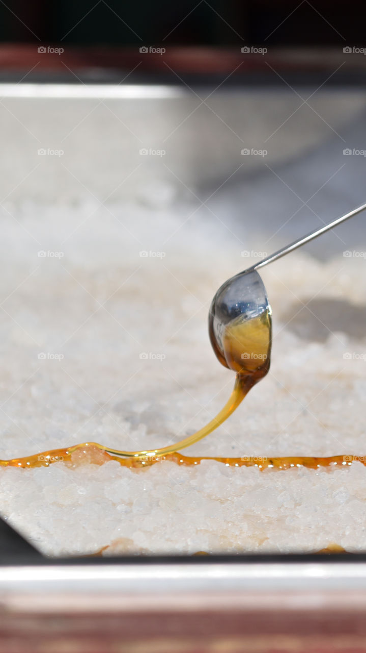 Fresh maple syrup on snow
