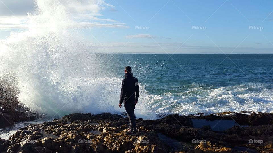 a very special moment watching my brother walking in the rocks and enjoying nature's show