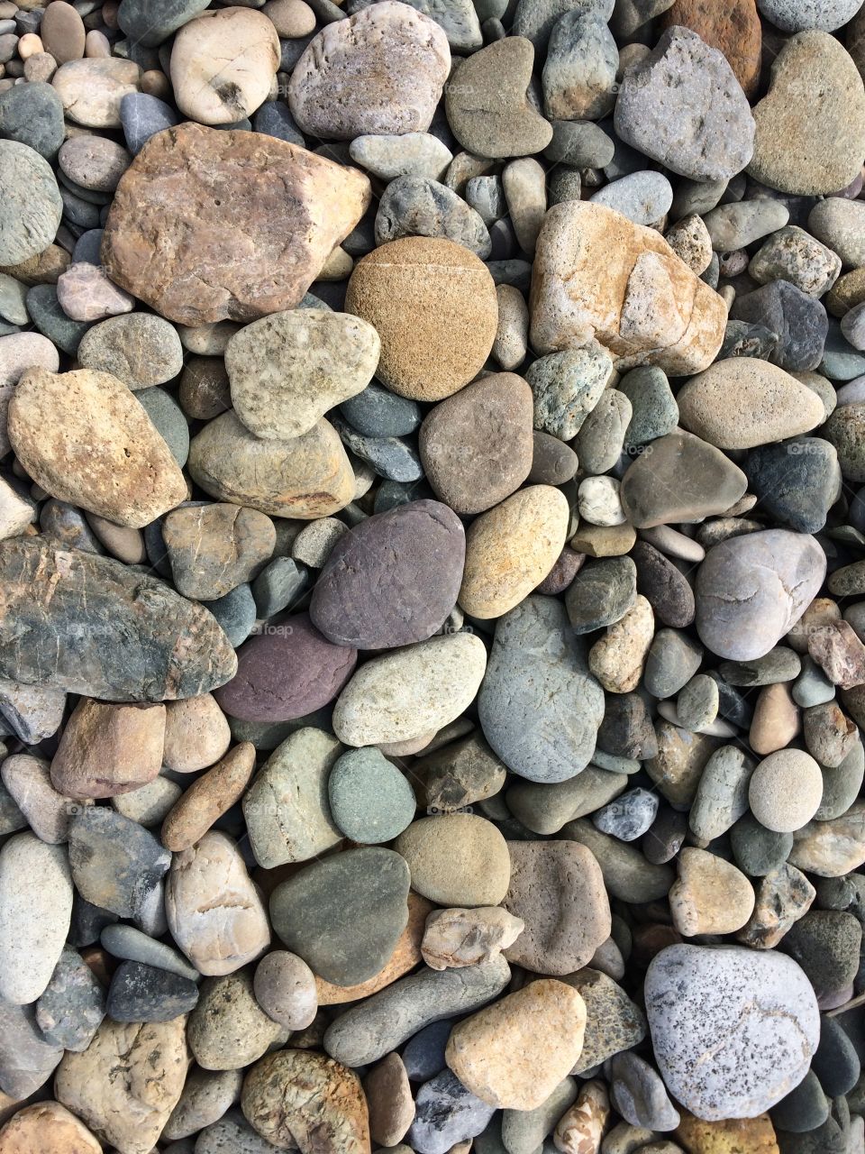 Water-rolled beach stones and pebbles