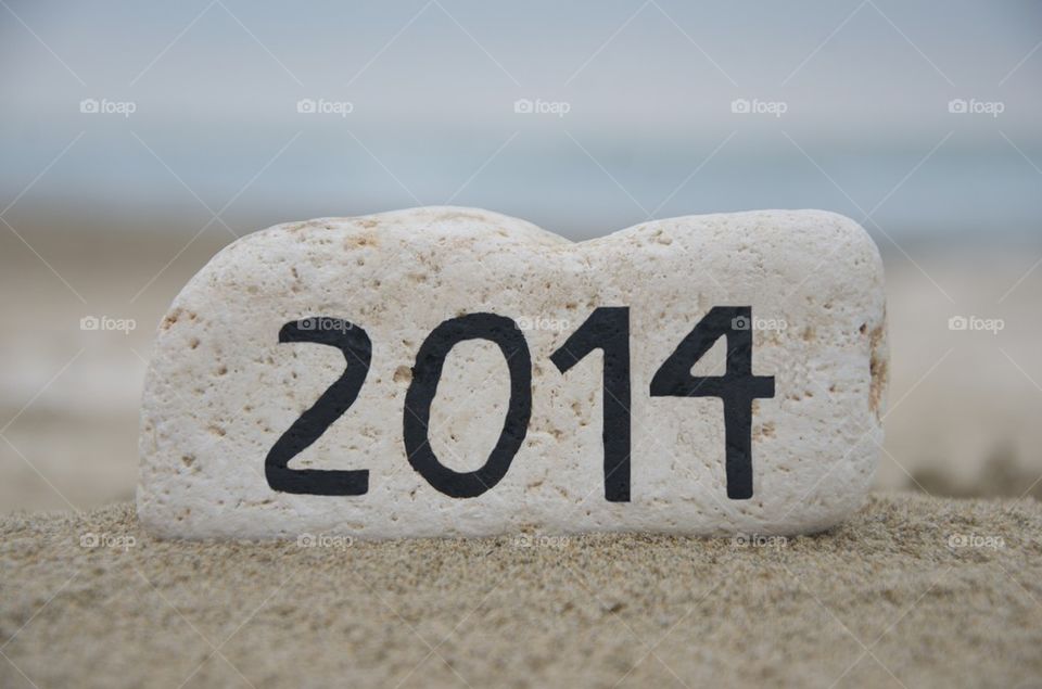 Happy New Year 2014 on a stone