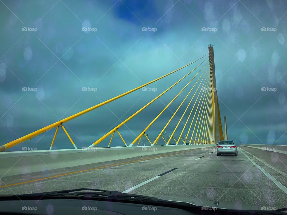 Driving over the Skyway bridge on a stormy day.