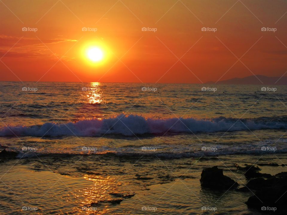 Scenic view of sea during sunset