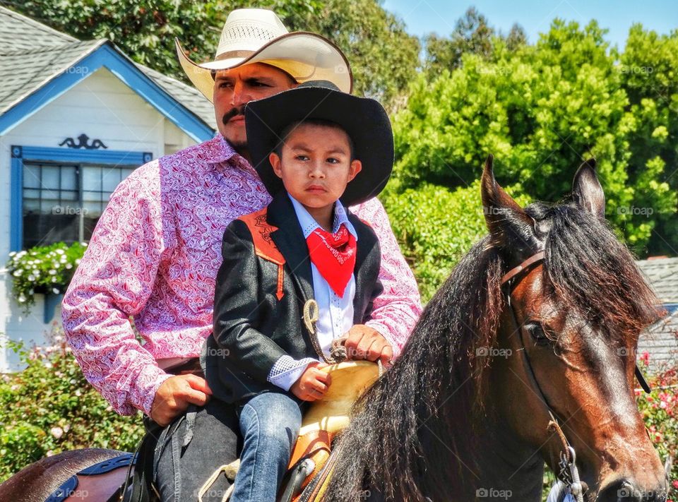 Cowboy Family. Proud Cowboy Dad With His Son
