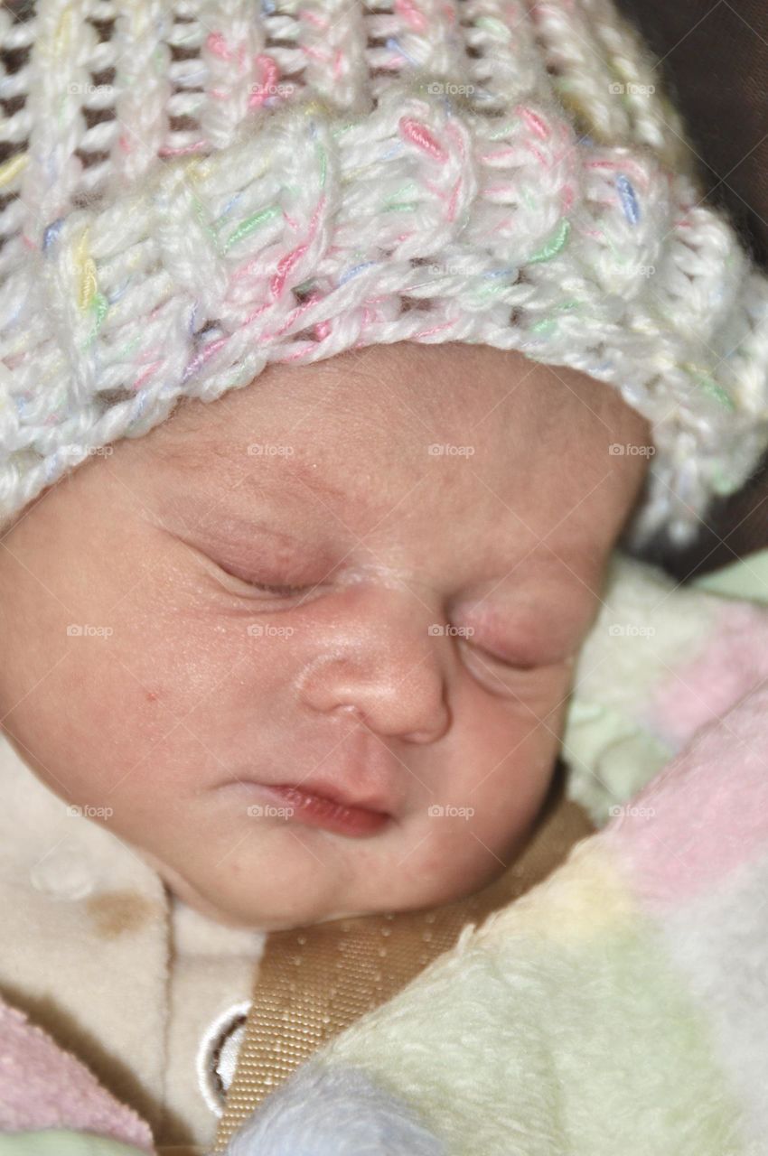 My 3 day old baby girl sleeping going to see the doctor for follow up check up with her cute hoodie 