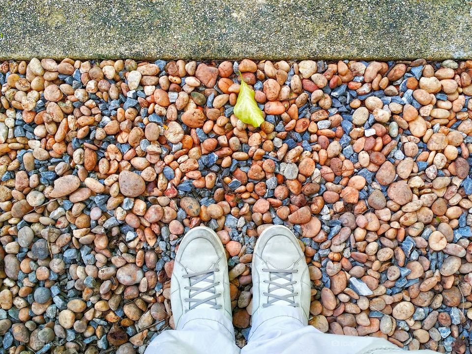 Standing on the colorful stone. Backgrounds and textures.