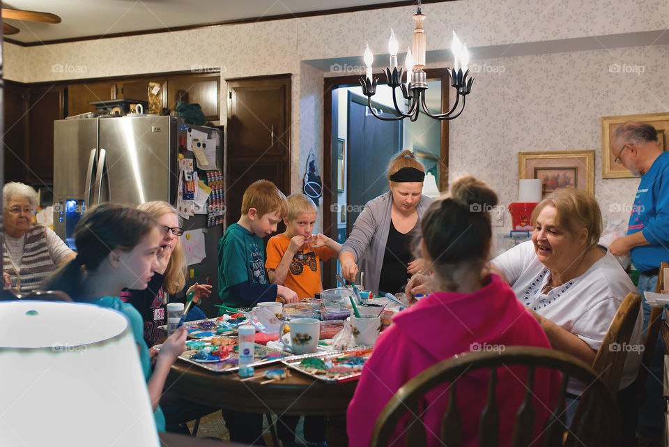 Family decorating Christmas cookies