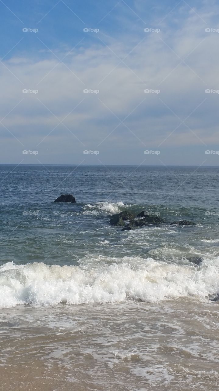 beach surf with rocks