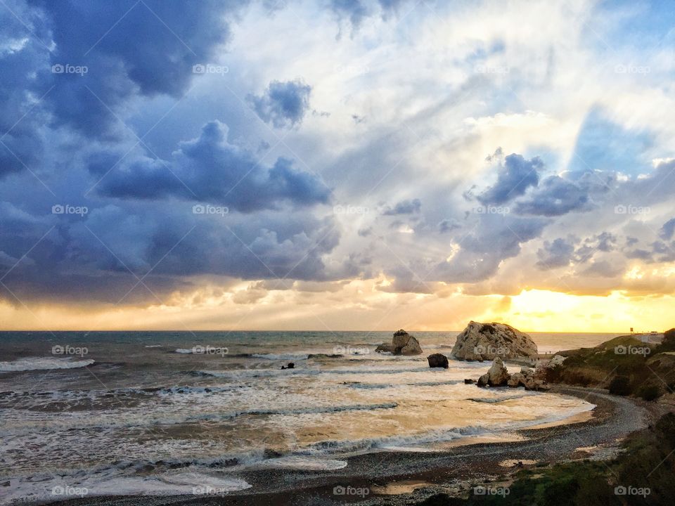 The sunset time is always a moment to enjoy. Especially if that is by the seashore, in a windy day with the waves giving a more dramatic sense to the whole picture!