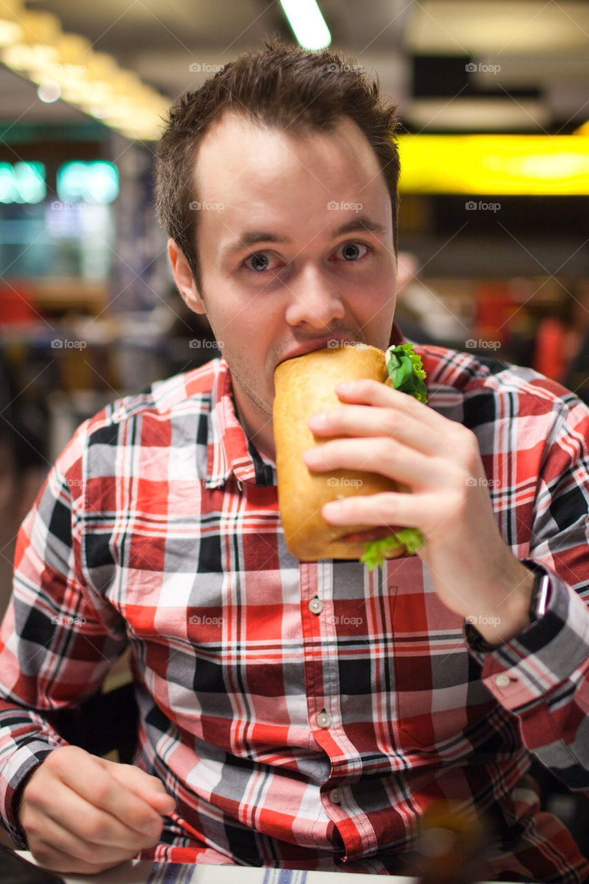 Man eating a sandwich