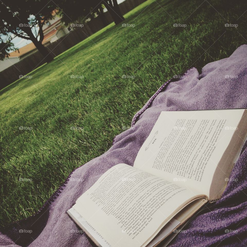 Storybook Paradise. Lounging in the sun, reading your favorite book.