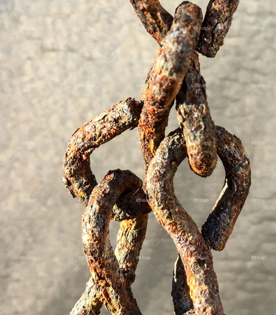 Old rusted chain links hanging