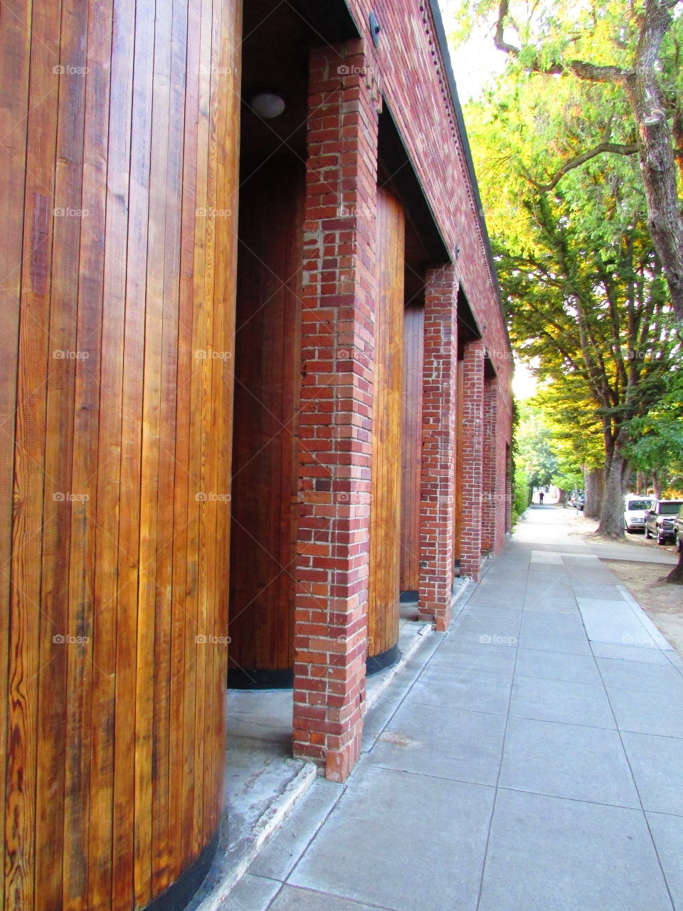 red brick pillars and hand carved ,hand finished pillars. Out front of a building on the streets of Sacramento California