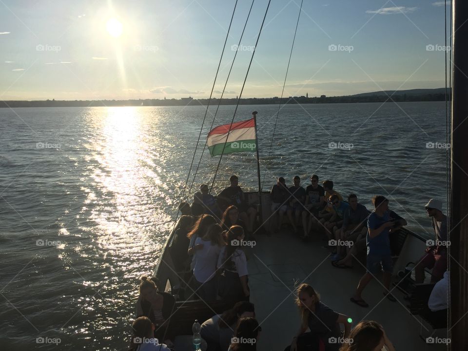 A boat ride in Hungary across Lake Balaton during the summertime at sunset. 