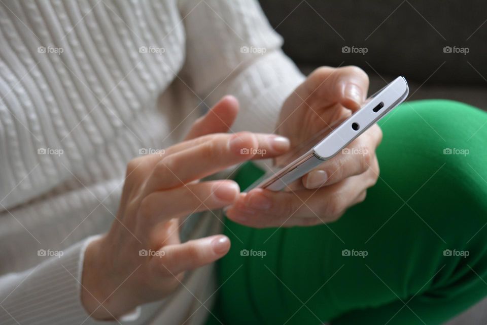 smartphone in the female hands, social media