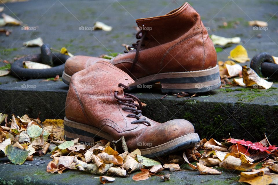 Boots and autumn background 