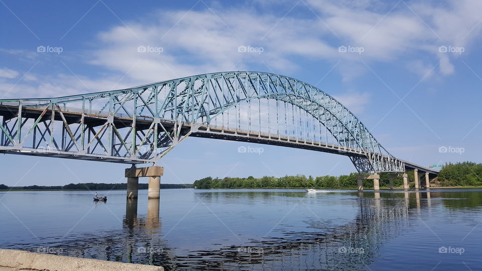 fishing by bridge on Saint John River NB