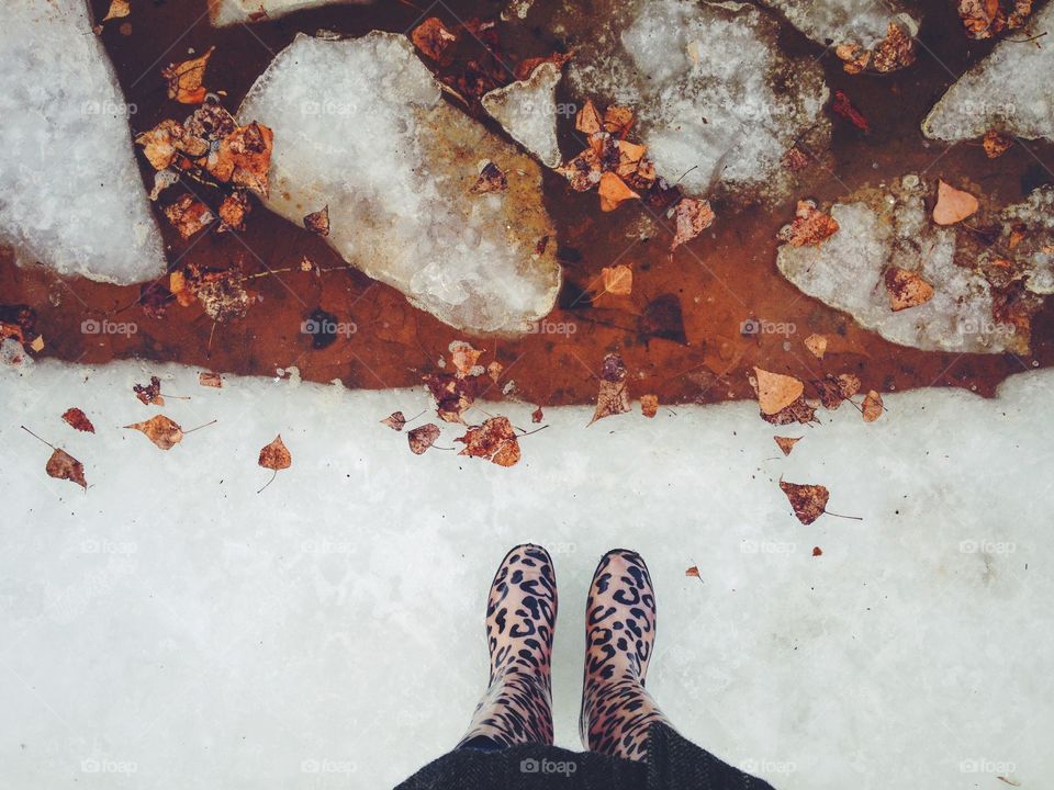 Feet view at the ice
