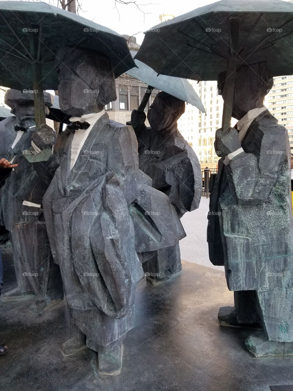 people umbrella sculpture downtown Chicago