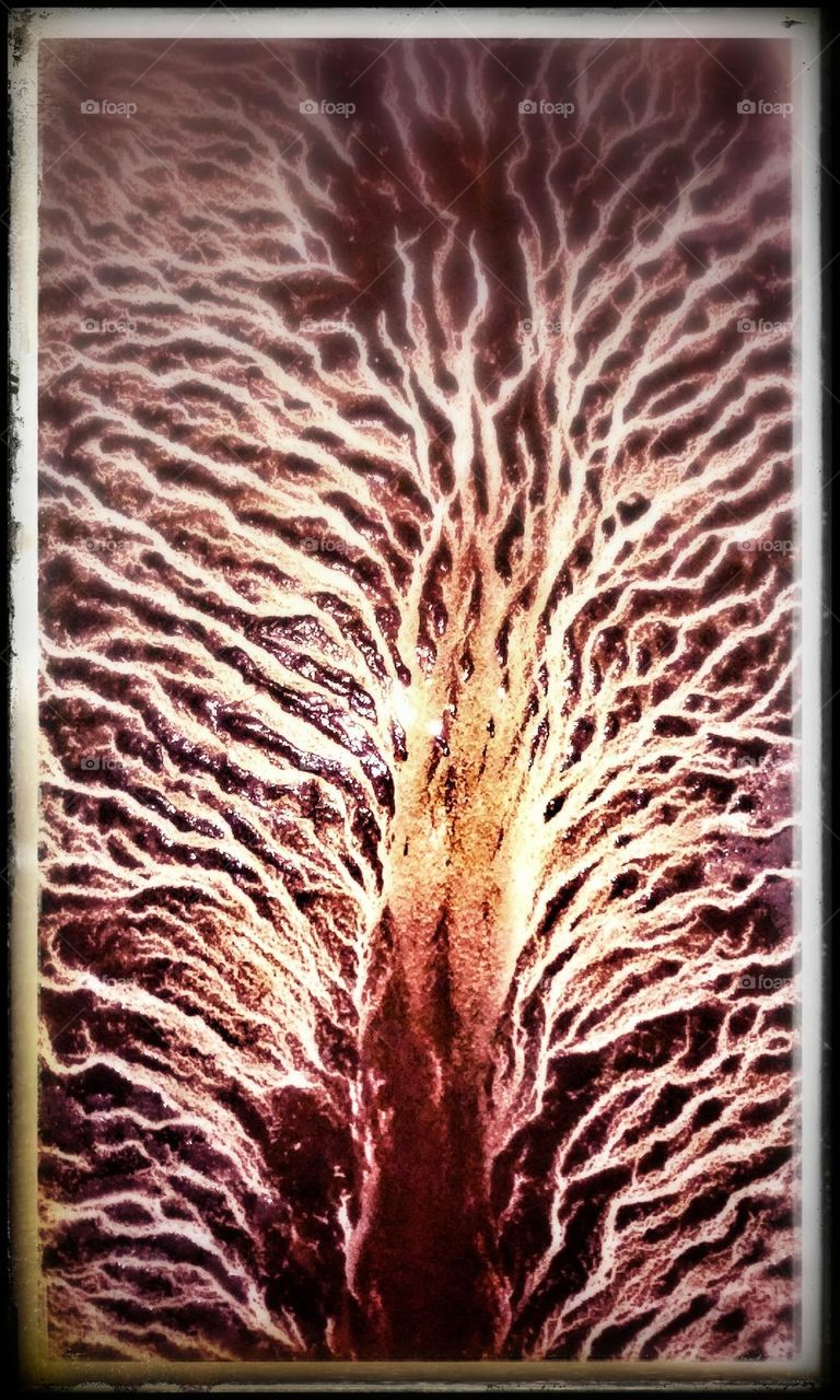 Muddy tub created unique pattern when drained.