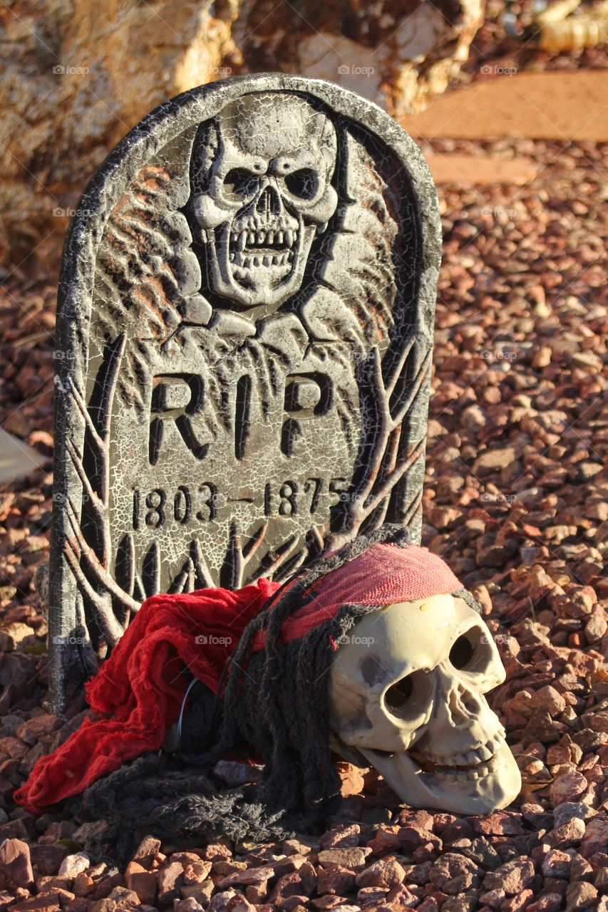 Zombie in front of headstone 