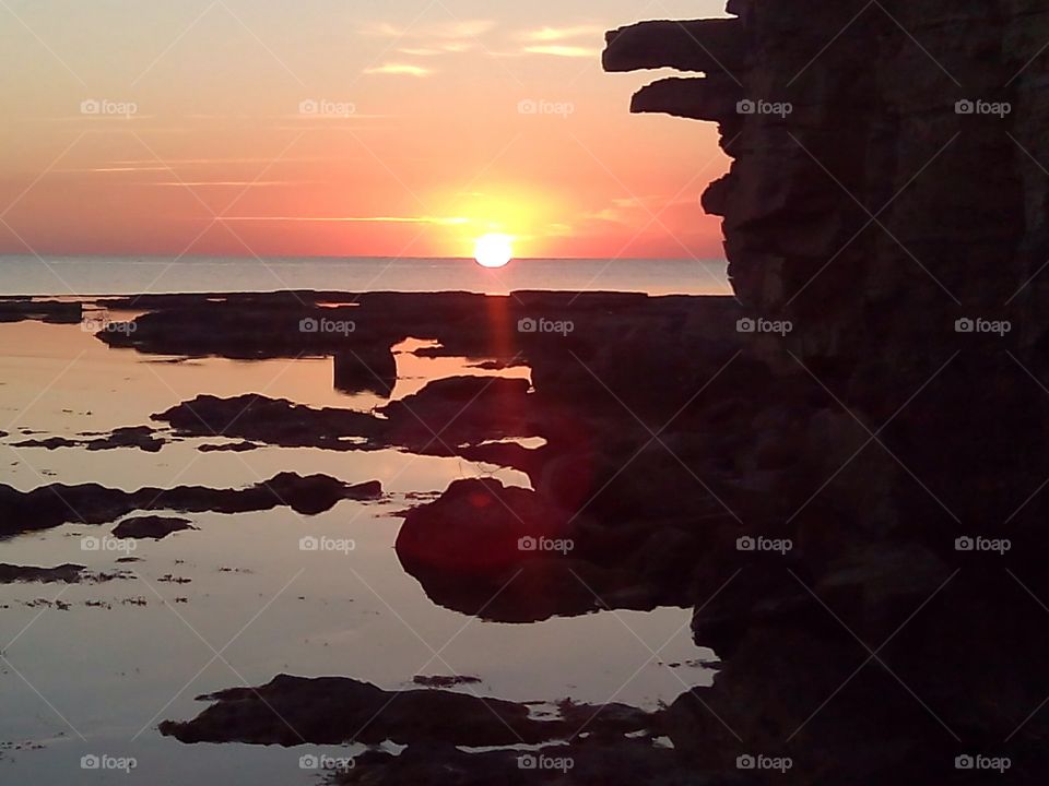 sea sunset and rocks face