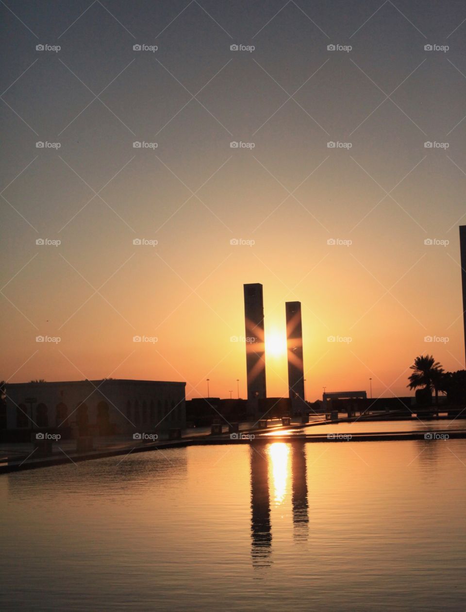 Sunset seen between pillars - Grand Sheikh Zayed Mosque 