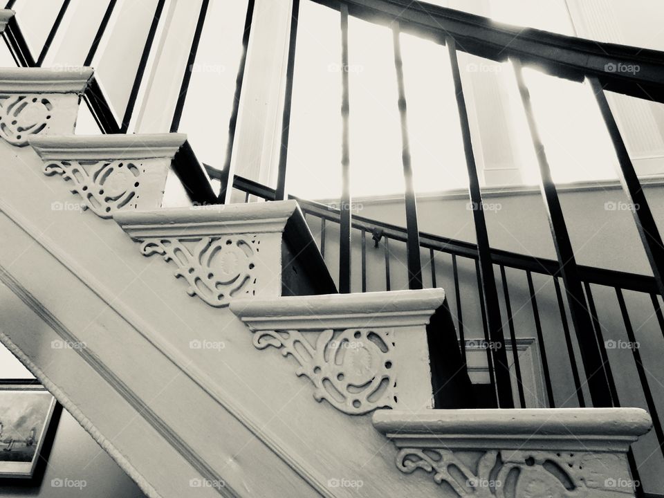 Stair treads display ornate detail in the historic Nathaniel Russell home in Charleston, SC.