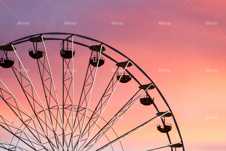 Ferris wheel silhouette at the fair