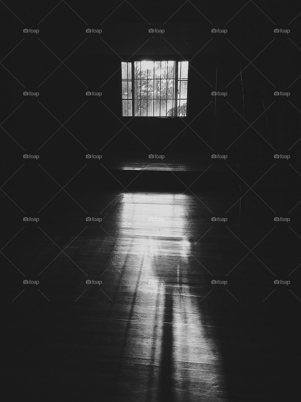 Ray of light passing through the window.