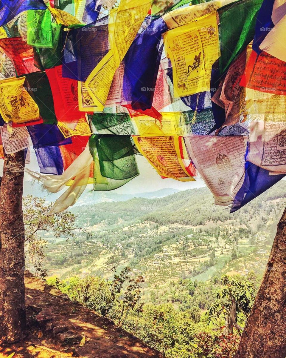 Prayer flags and the valley below! “Oneness with all things”