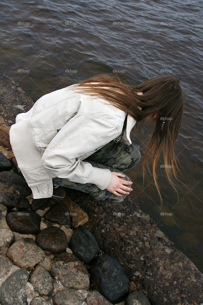 Girl next to water 