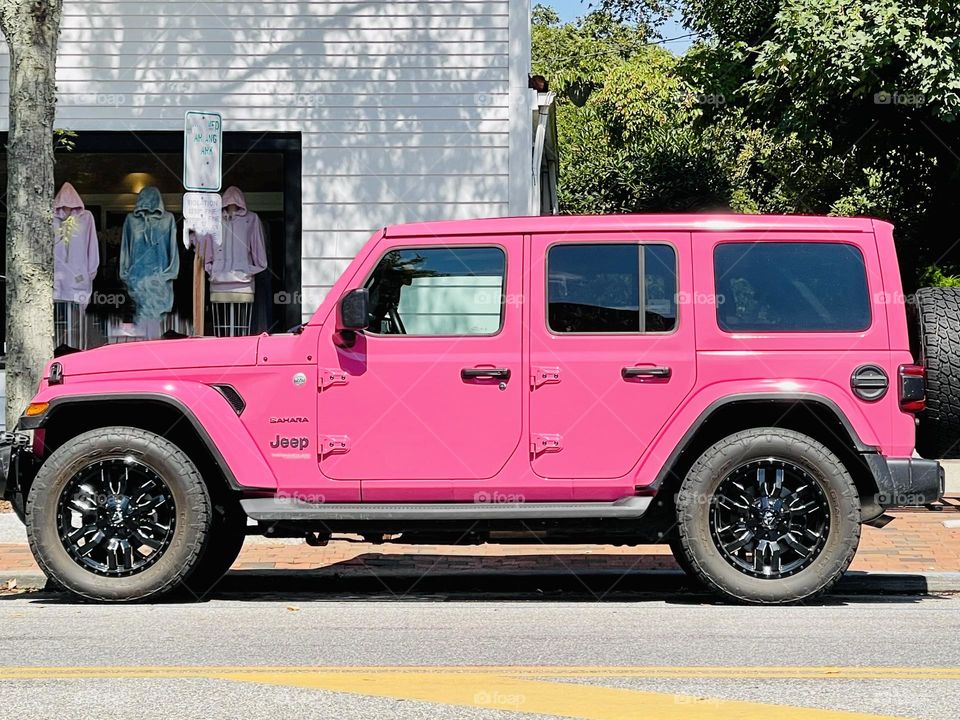 Power wheels in bright pink Barbie style. 