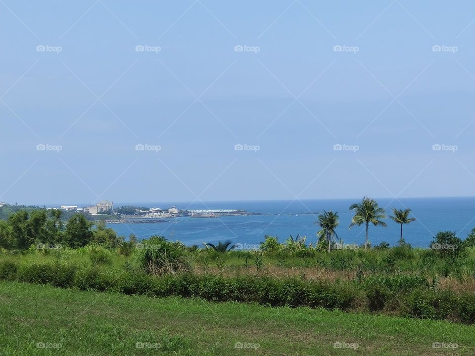 View of the sea from a hill in the city