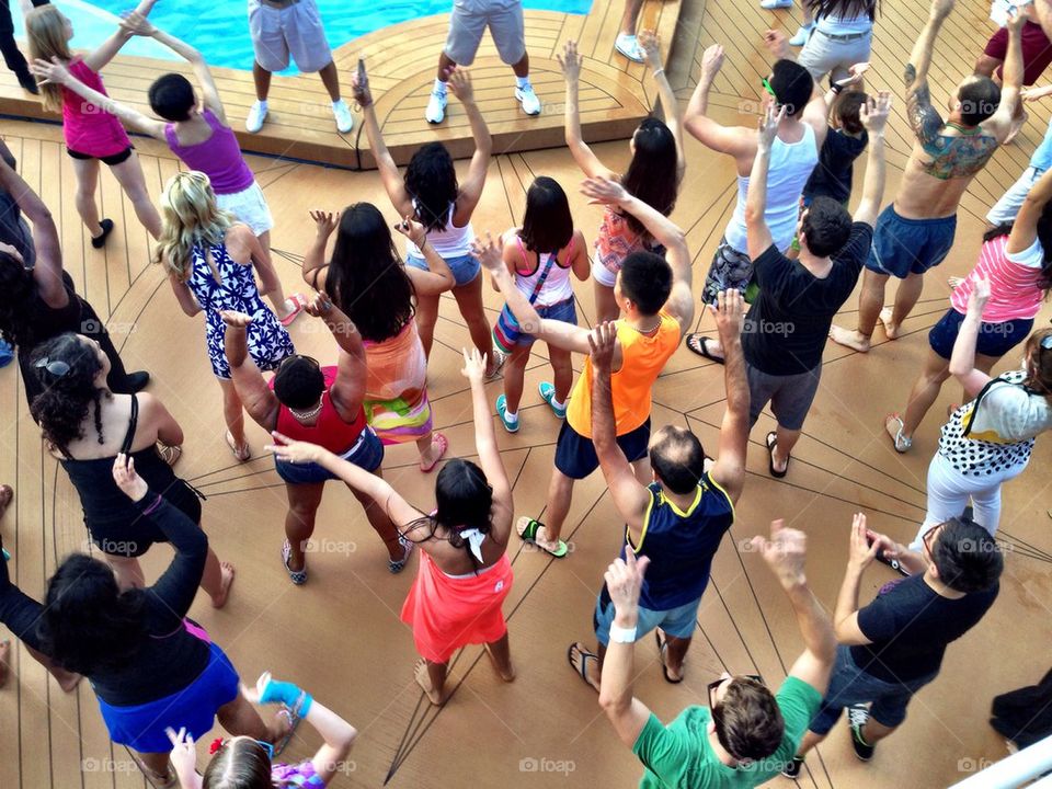 People dancing on cruise ship deck