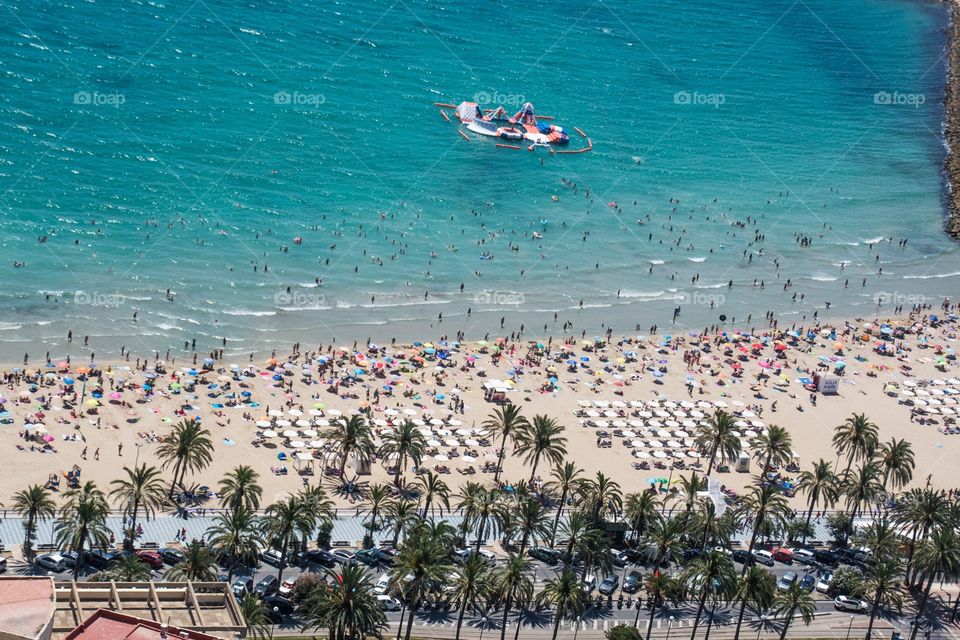 Taking a photo from above, looking down on the beach in altea, spain