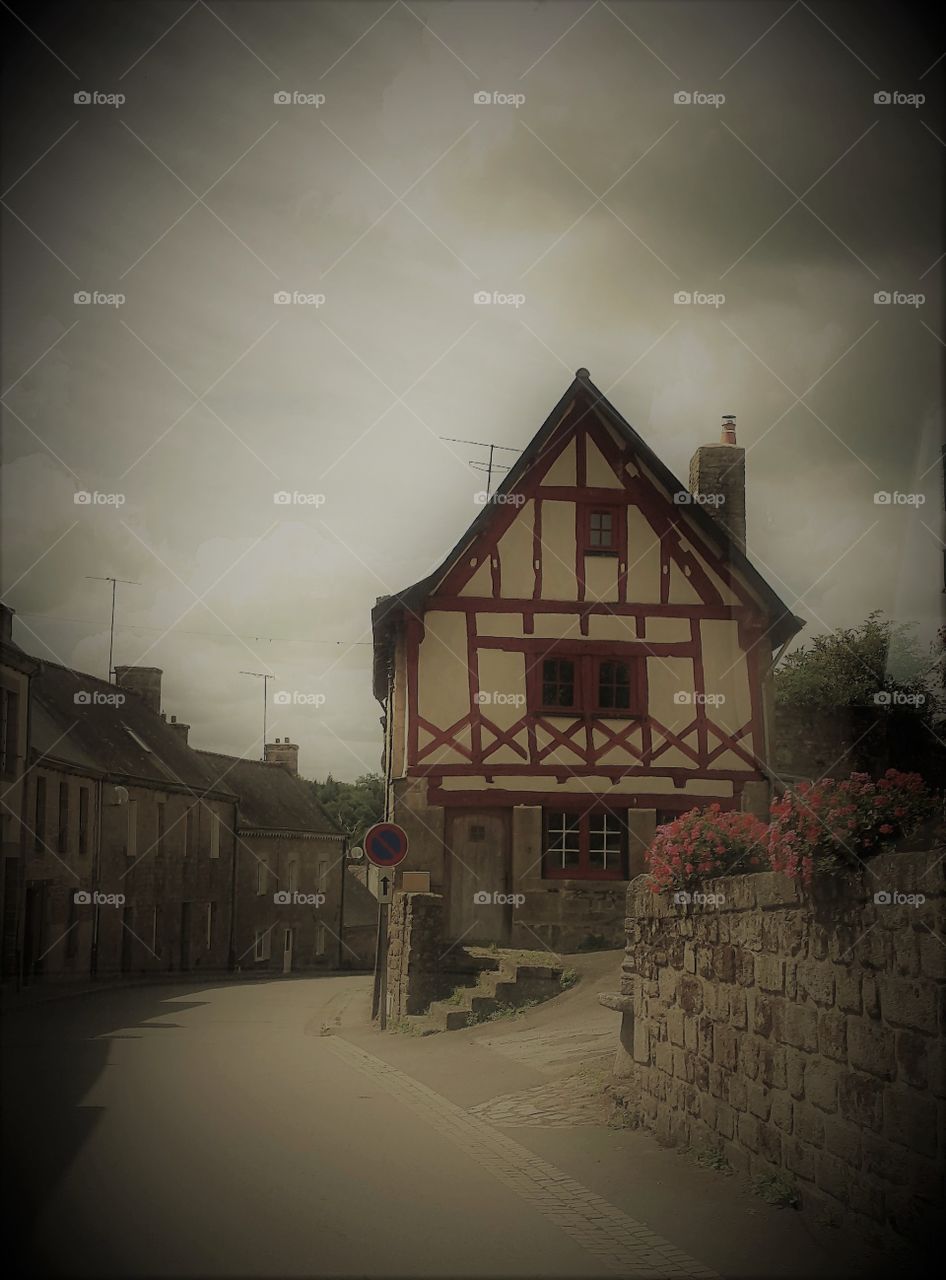 French medieval house in sepia, faded out