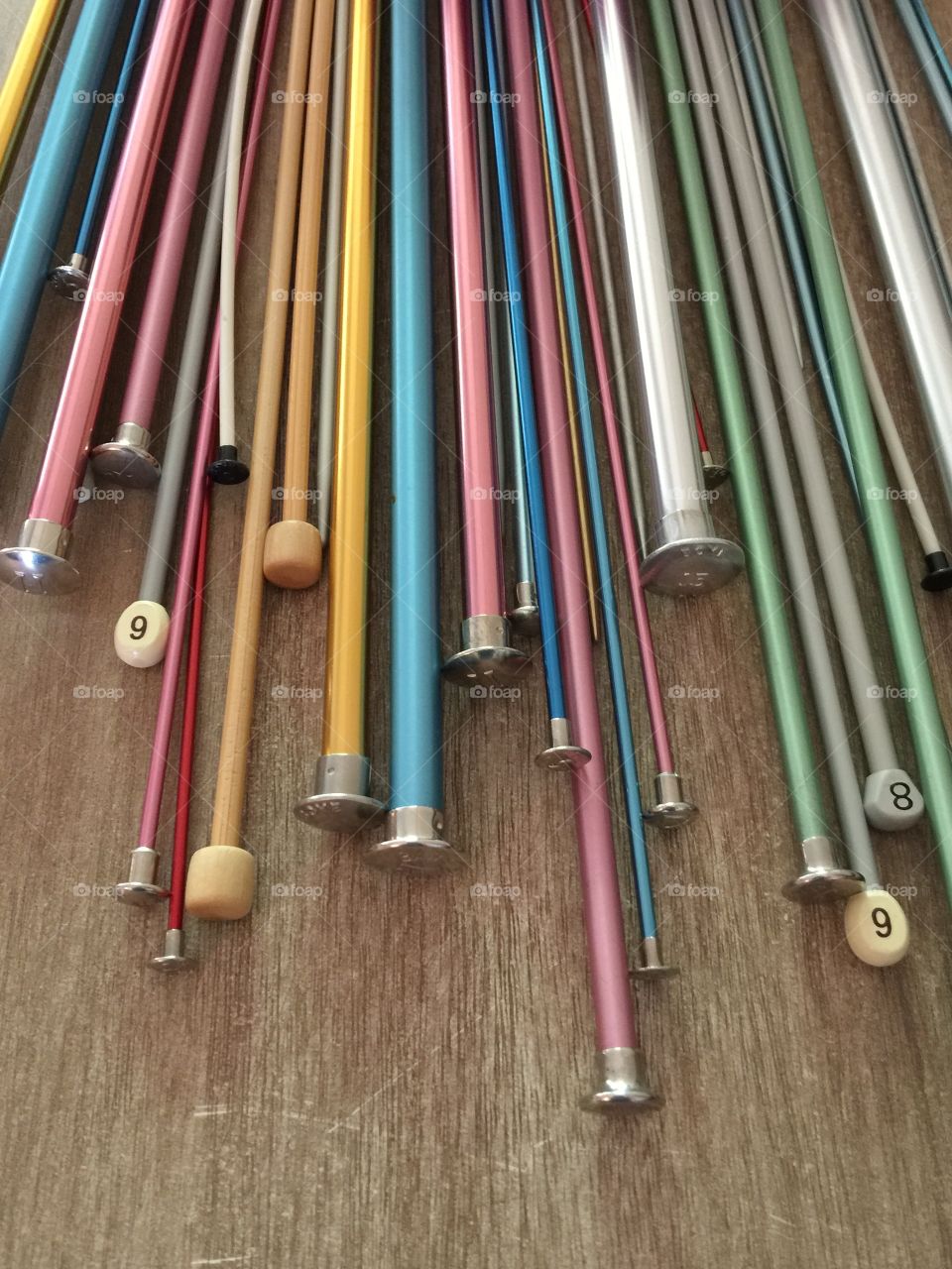 Multi colored knitting needles