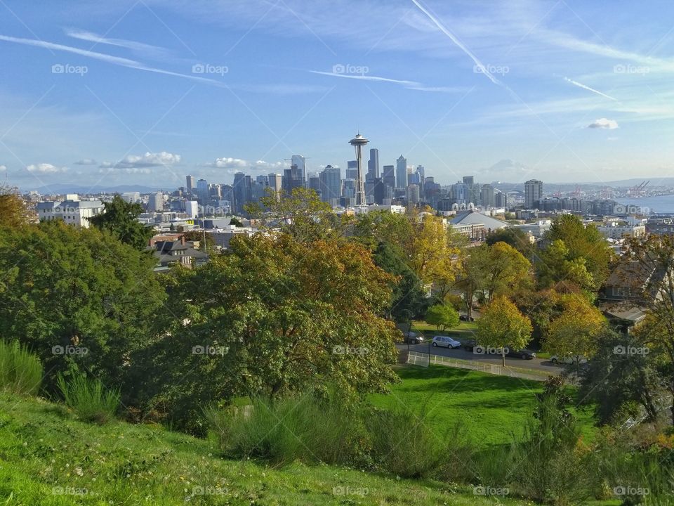 Seattle Skyline Landscape. A wide scenic landscape view of downtown Seattle Skyline with the Space Needle and Mt Rainer in the background