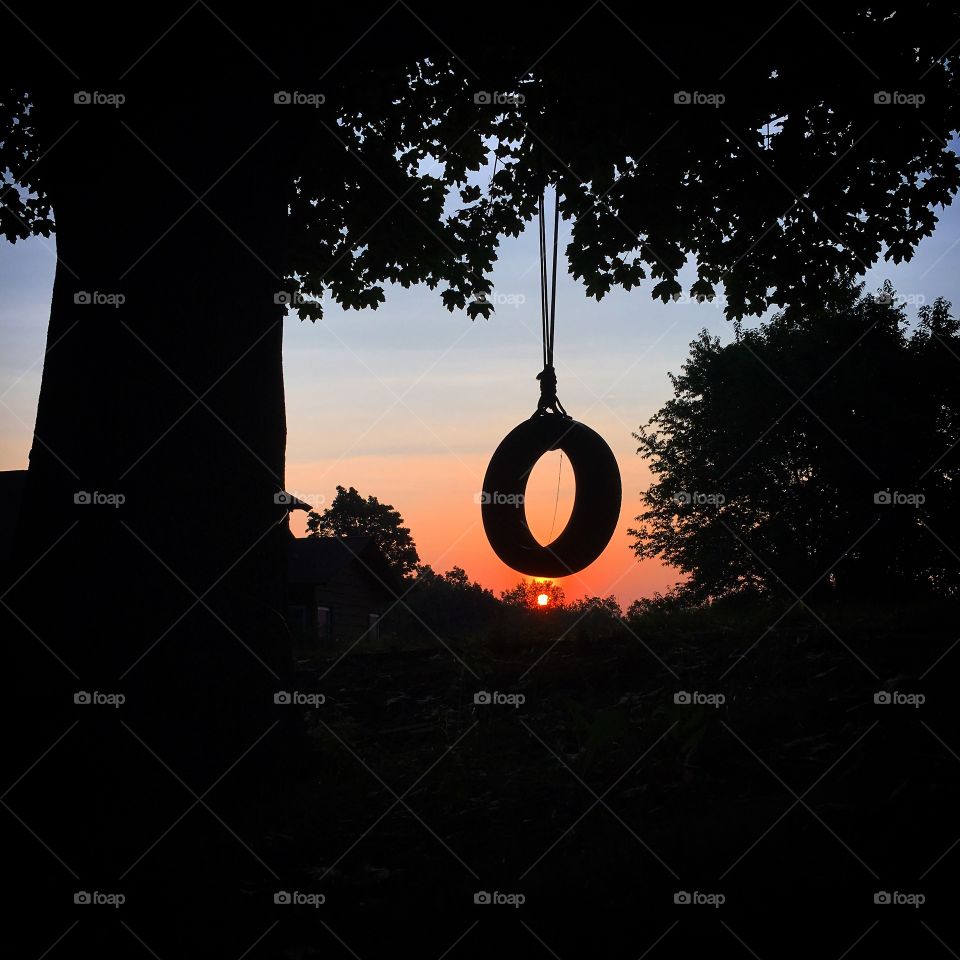 Sunrise On a tired swing