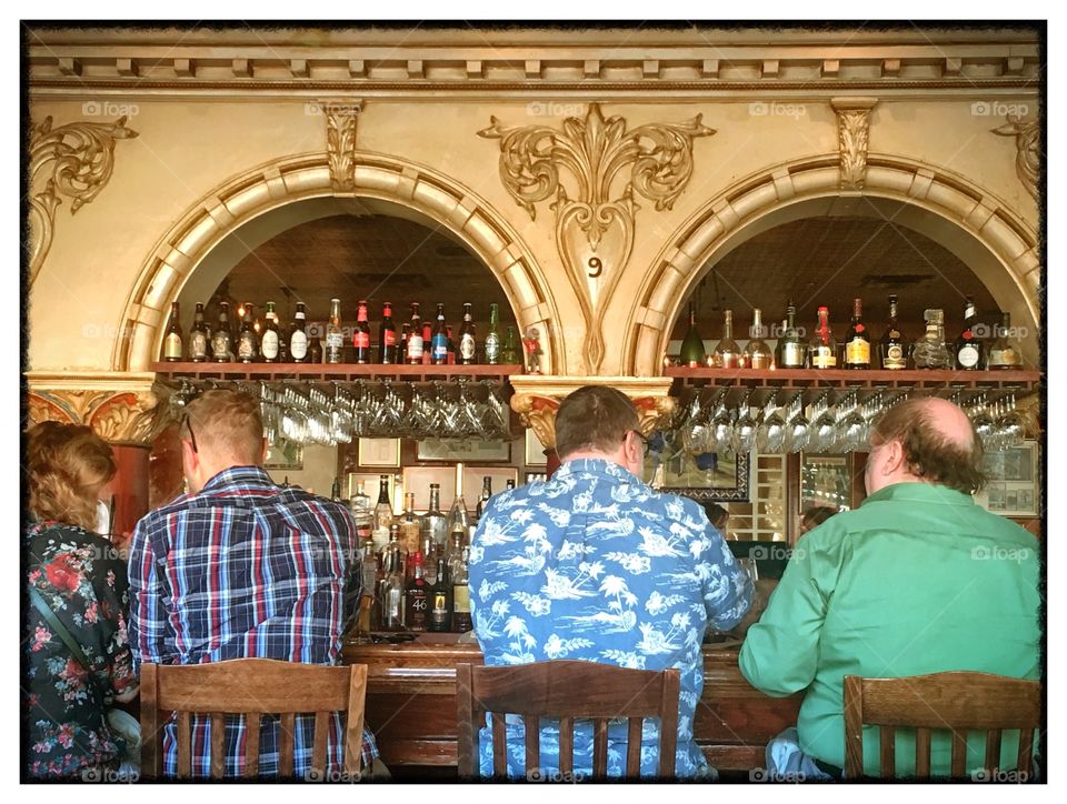 Men at Cuban restaurant bar, Florida