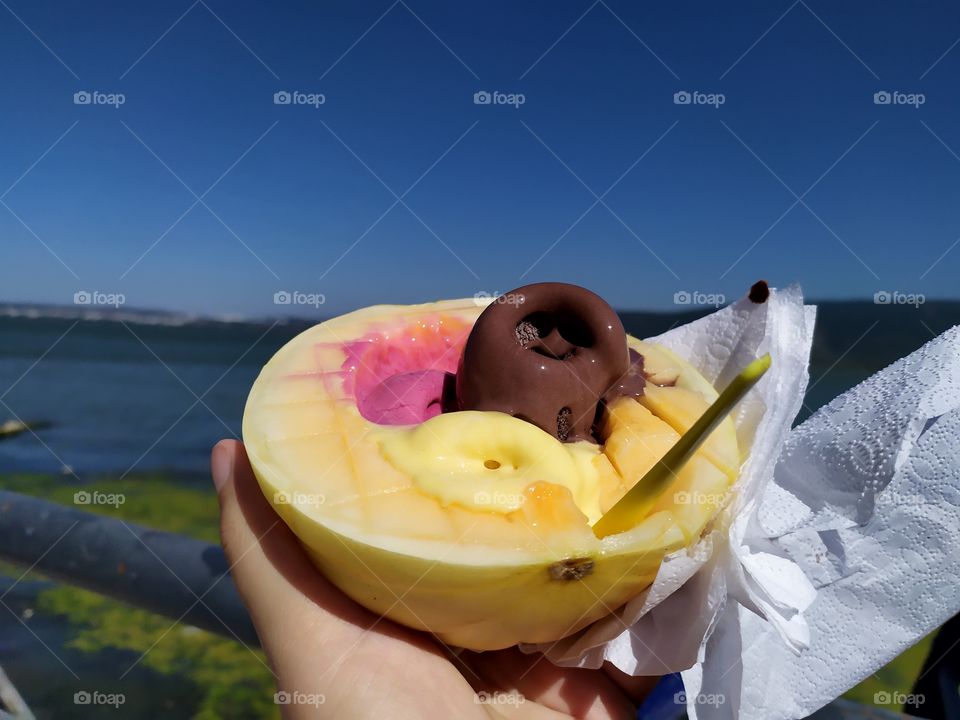 The most delicious composition and the harmony of colors. A fabulous ice cream melon in an amazing setting