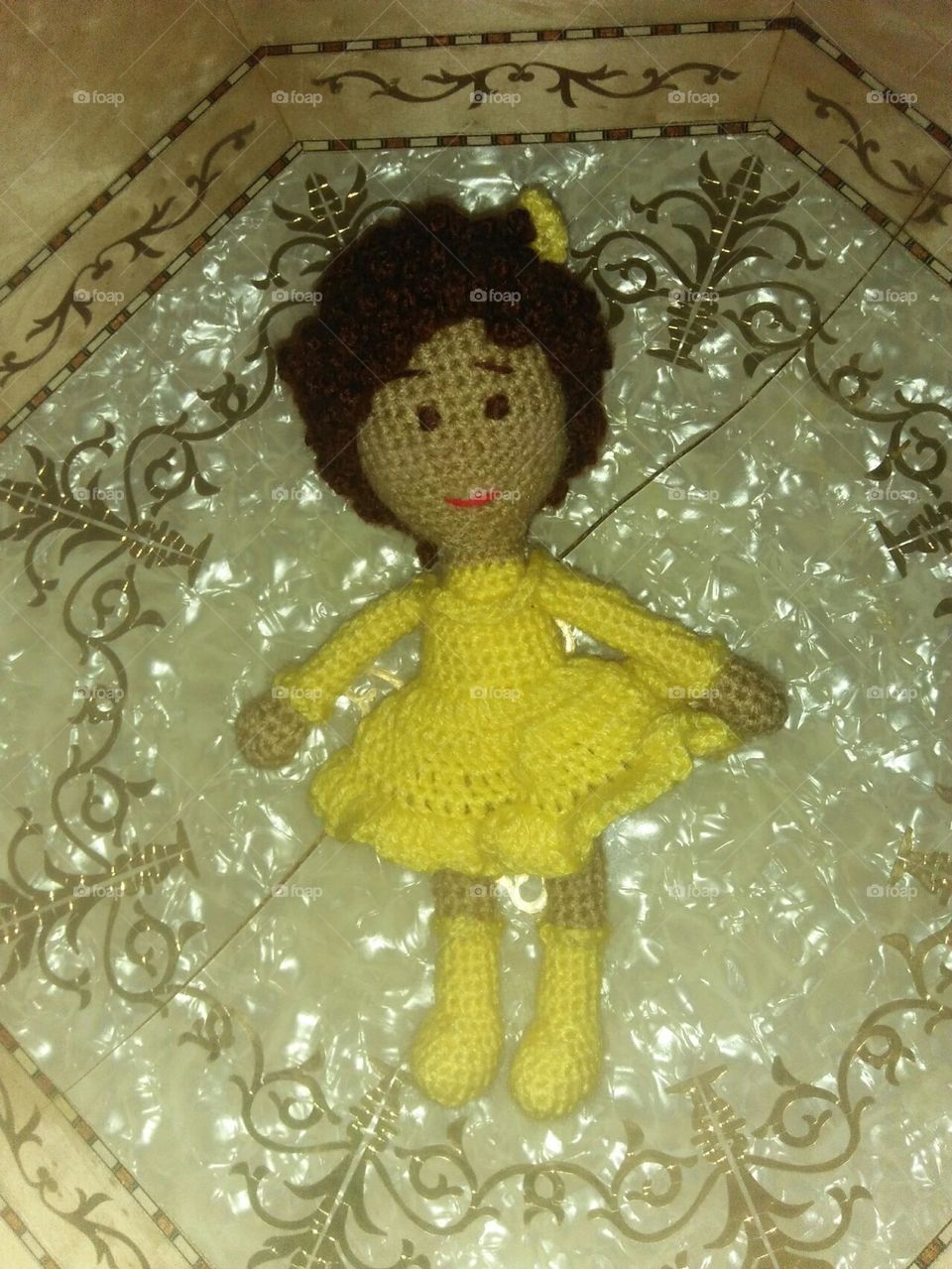 a yellow girl doll