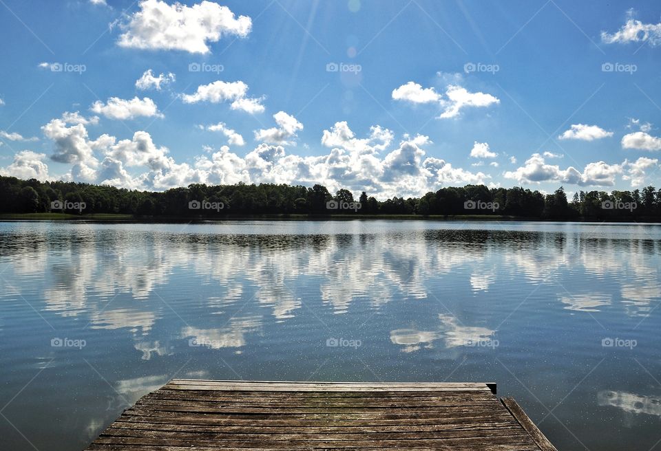 sunny day at the lake in polish countryside