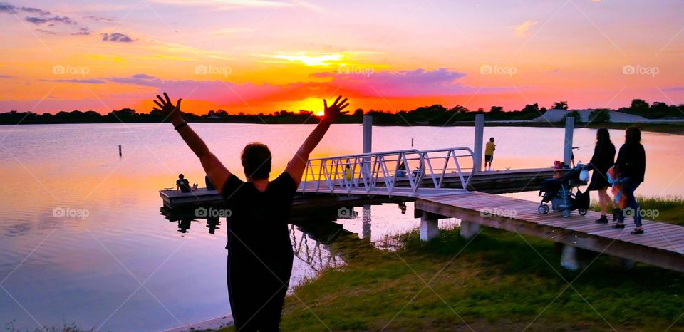 People enjoying gorgeous spring sunset