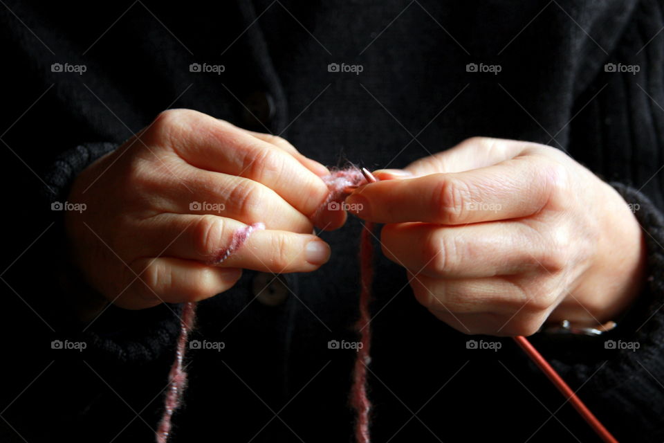 Extreme close-up of knitting hands