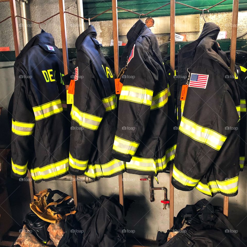 Firefighter jackets hanging in the Firehouse