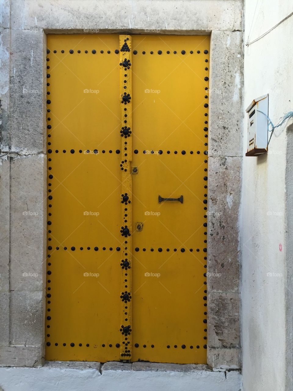 Beautiful yellow decorative door in Tunisia, Africa