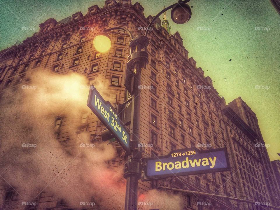 Broadway Midtown. Intersection of Broadway and West 32nd Street at Dusk