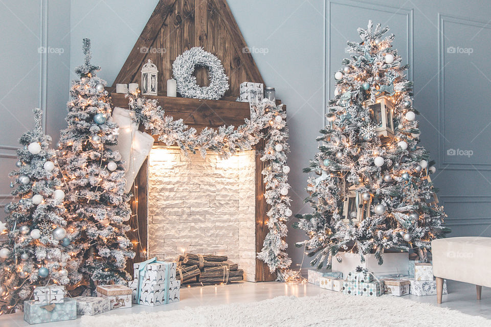 Christmas decoration with fireplace in the room