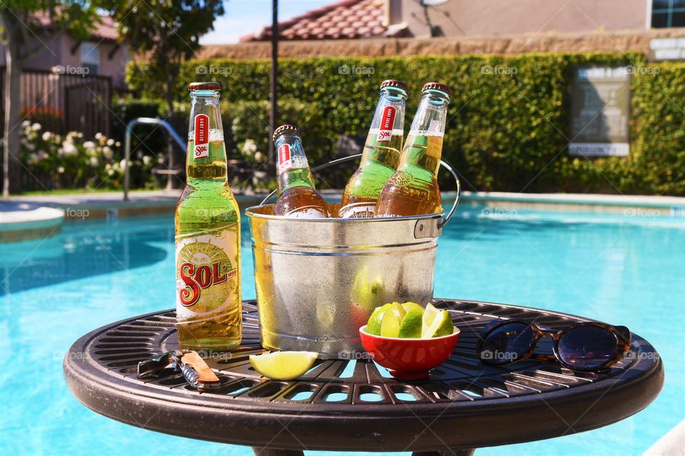Icy cold beer by the pool